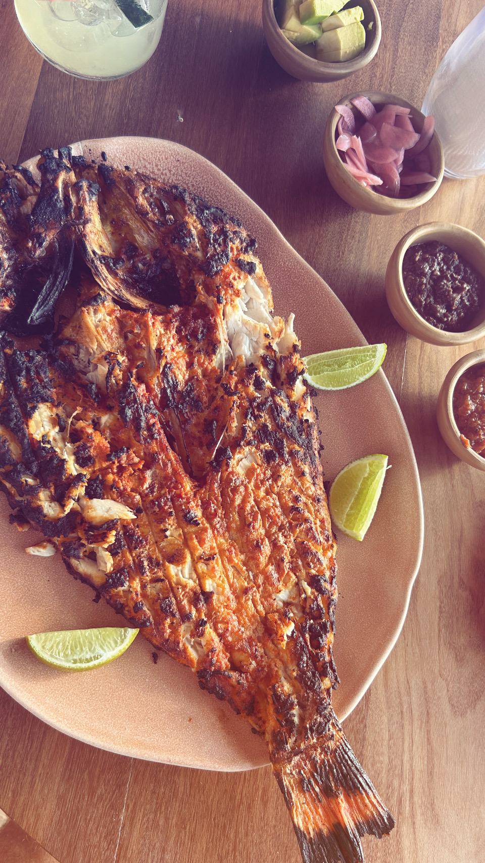 Grilled whole fish with lime and salsas