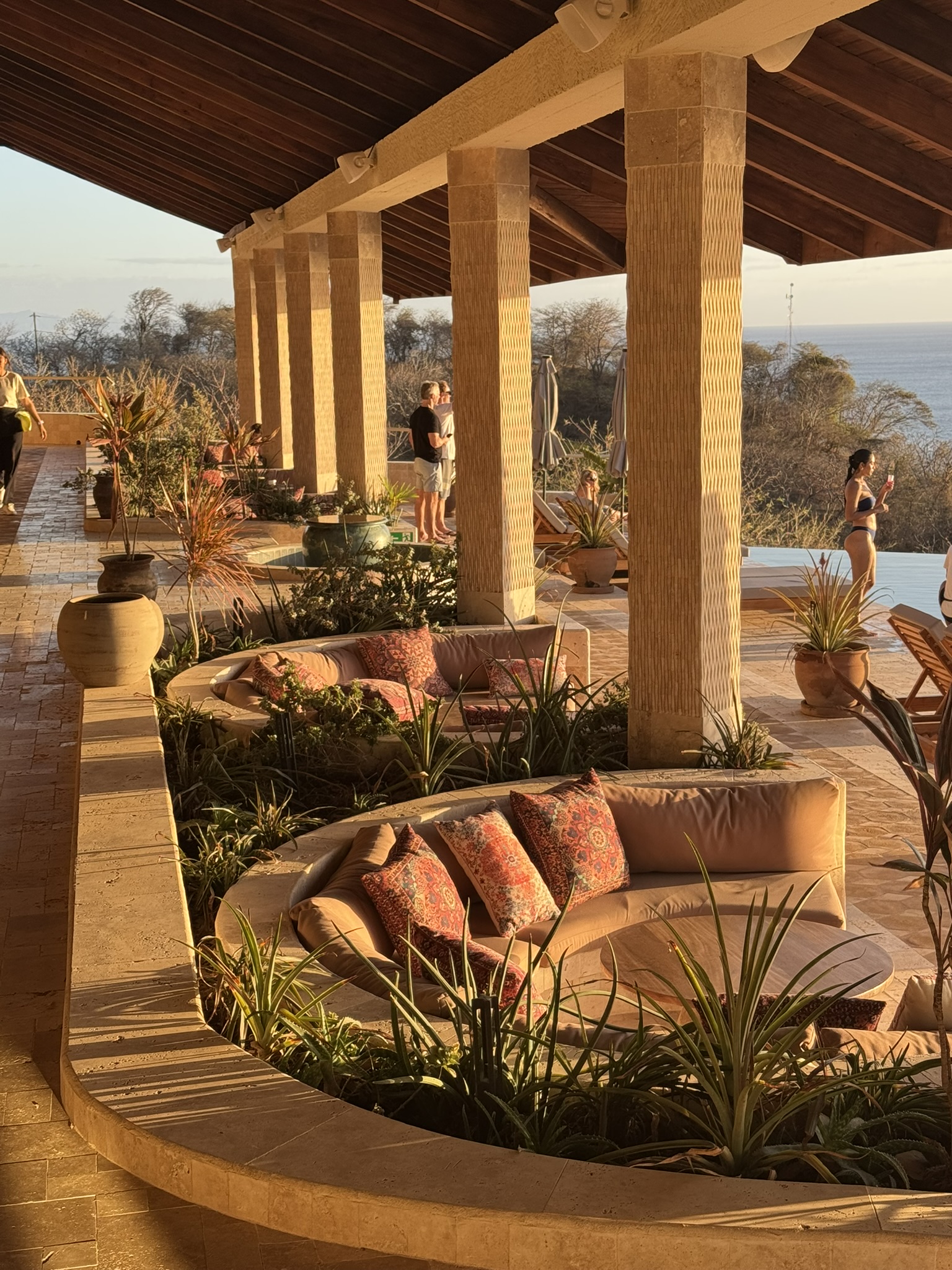 Sunken lounge seating with columns overlooking the Pacific